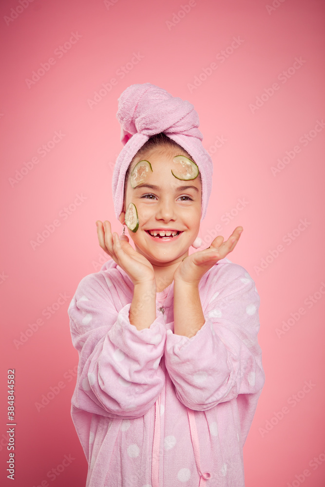 girl in a terry dressing gown and with a towel wrapped around her head girl in a terry dressing gown and with a towel wrapped around her head