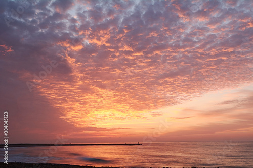 Rocky beach at sunrise, colors