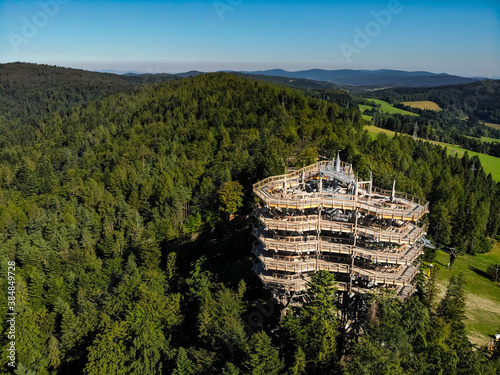 Tree top observation tower in resort town Krynica-Zdroj in summer photo