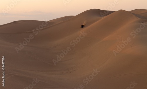 Riding the dunes at sunrise