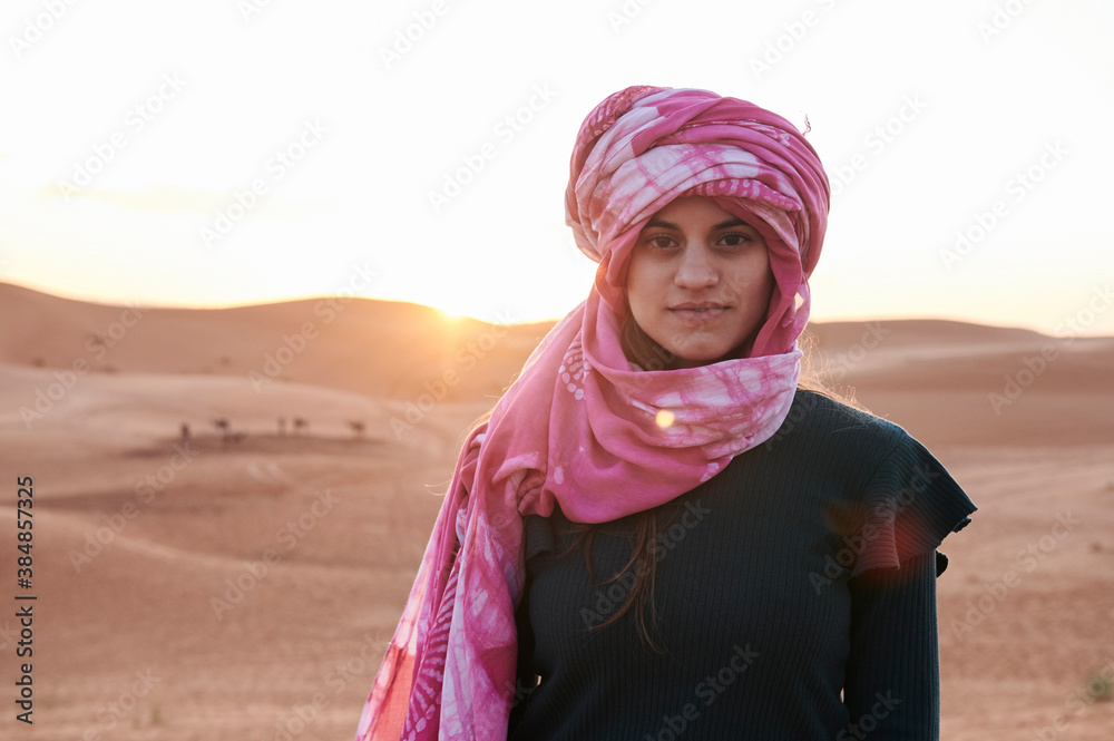 Young woman turban desert sunset portrait Young woman turban desert sunset portrait