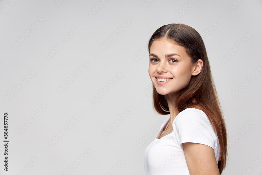 Cheerful woman smile white t-shirt cropped look Cheerful woman smile white t-shirt cropped look