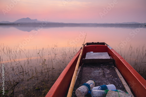 Point of view from the boat in the misty morning