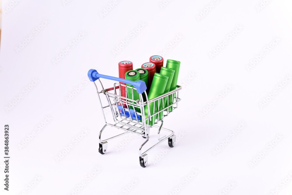 Li ion 18650  battery in the shopping cart, on the white background.