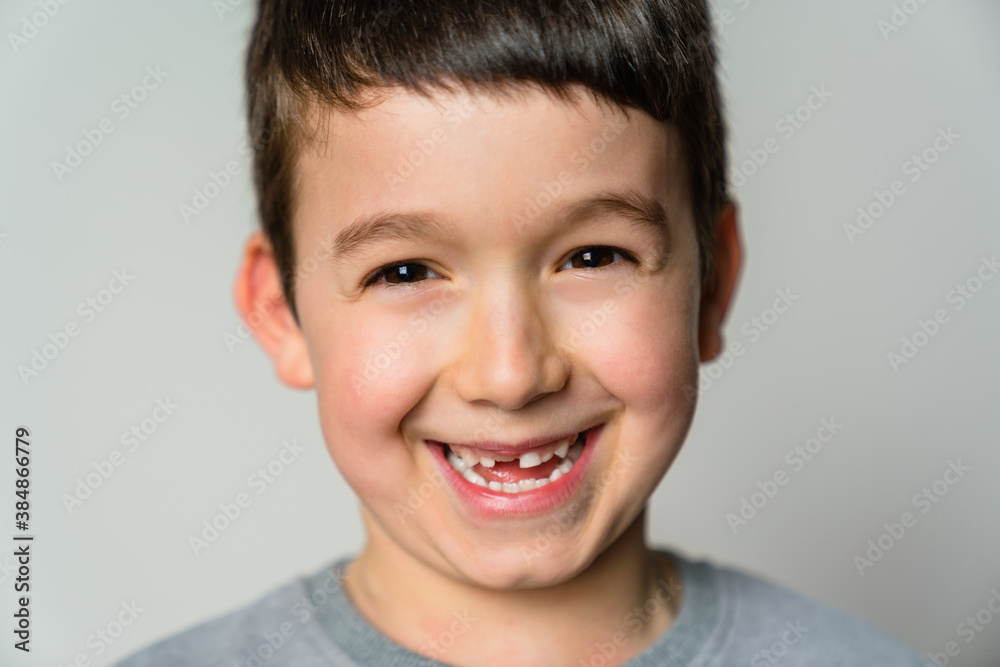 Crop positive little child on white background Crop positive little child on white background