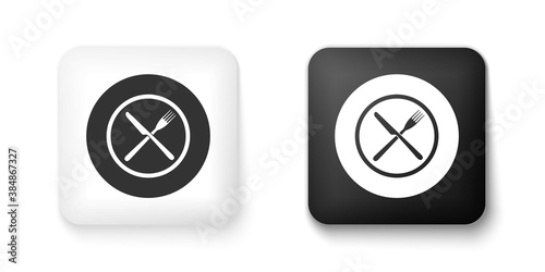 Black and white Crossed fork and knife on plate icon isolated on white background. Restaurant symbol. Square button. Vector.