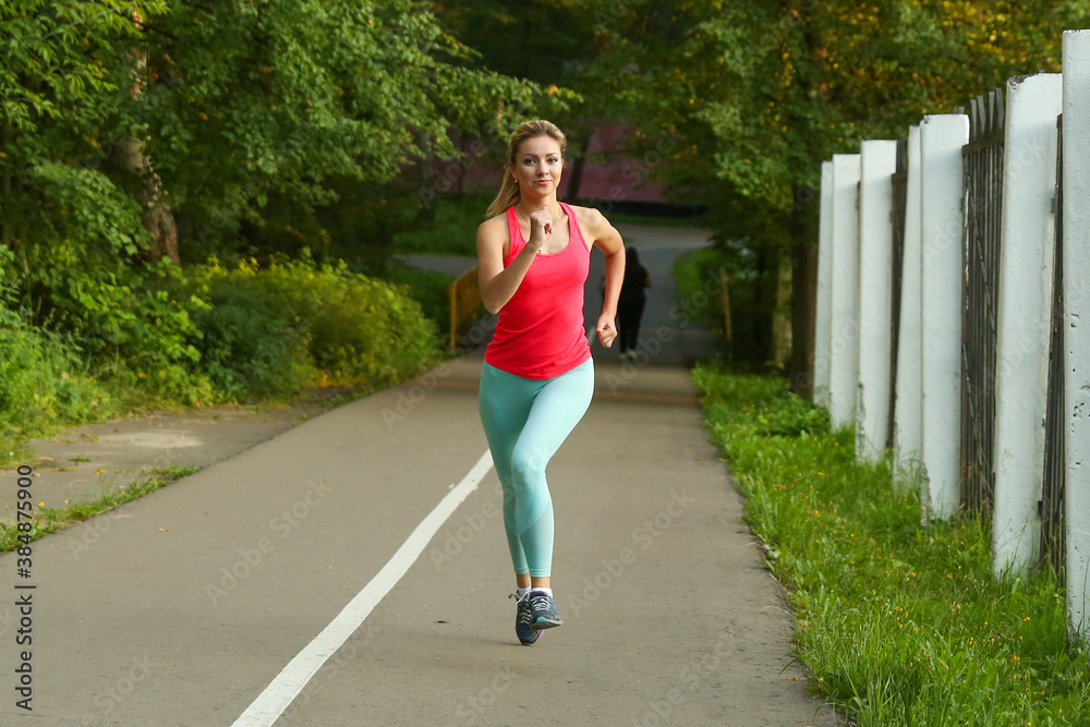 beautiful woman doing a jog in summer