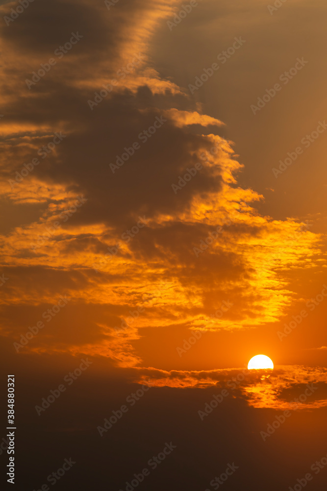 golden orange clouds at sunset background