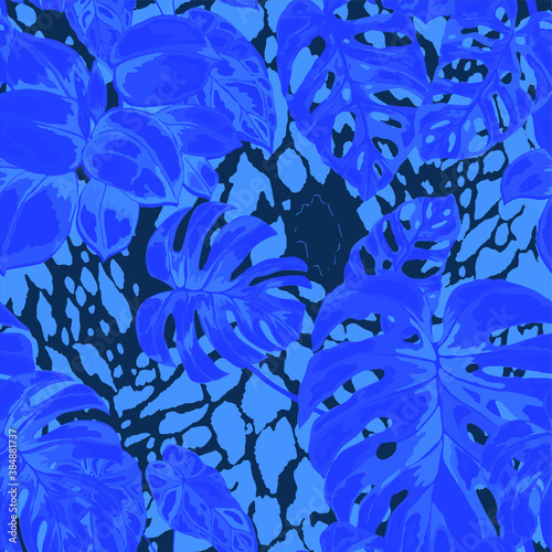 Tropical seamless pattern on animalistic texture. Jungle exotic summer print. Summer tropical leaf. Tropical flower fashion pattern. Floral tropic illustration. Vector seamless pattern.