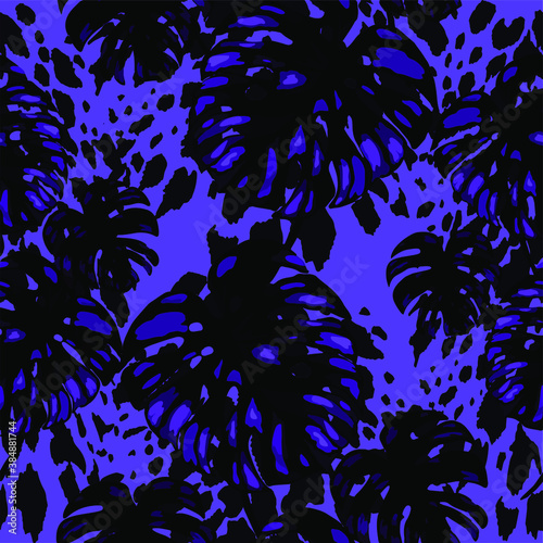Tropical seamless pattern on animalistic texture. Jungle exotic summer print. Summer tropical leaf. Tropical flower fashion pattern. Floral tropic illustration. Vector seamless pattern.