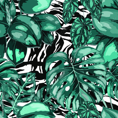 Tropical seamless pattern on animalistic texture. Jungle exotic summer print. Summer tropical leaf. Tropical flower fashion pattern. Floral tropic illustration. Vector seamless pattern.