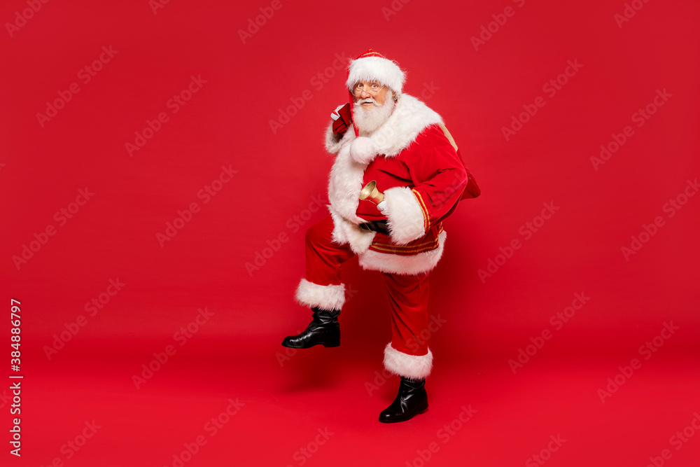 Funny Santa Claus holding sack bag with Merry Christmas presents. Funny Santa Claus holding sack bag with Merry Christmas presents.