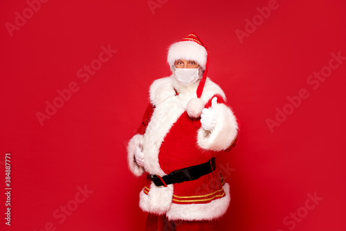 Real Santa Claus in white mask posing
