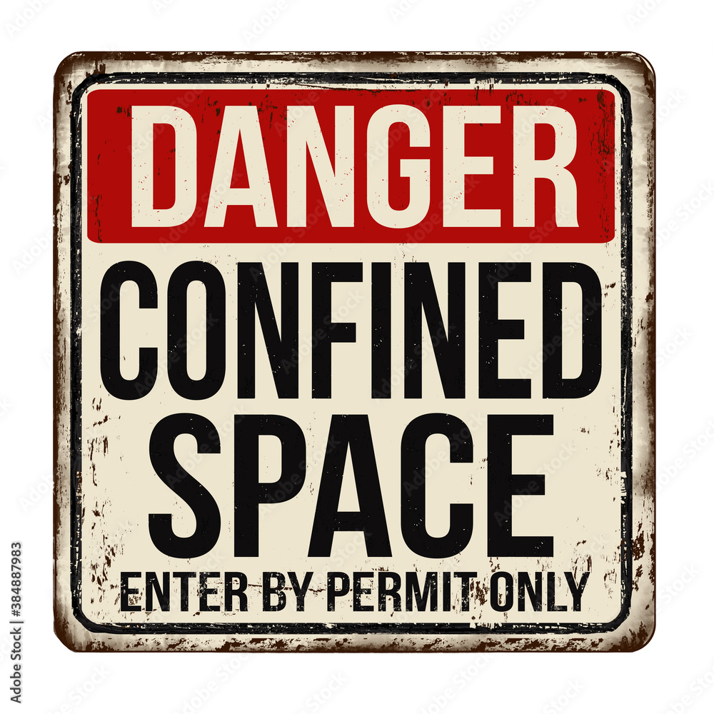 Confined space vintage rusty metal sign