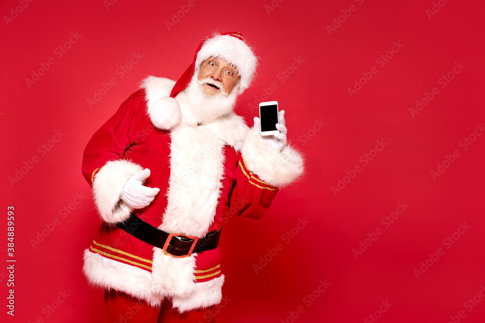 Real Santa Claus showing mobile phone screen Real Santa Claus showing mobile phone screen