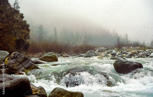 Mountain river. Stones and water of mountain river. The mountains are said. photo