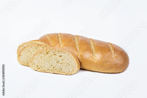Fresh bakery product. Bread. Loaf of sliced yeast-free isolated on white background. Top view and copy space for text.
