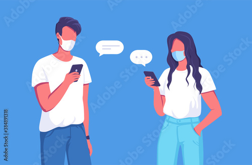 Young couple wearing mask and using mobile technology for communication 