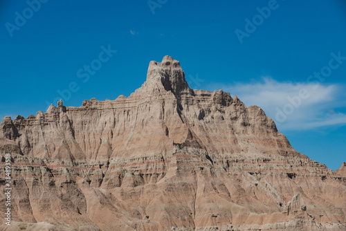 Layered Rock formations, steep Canyons and towering Spires of Badlands National Park in South Dakota. USA.