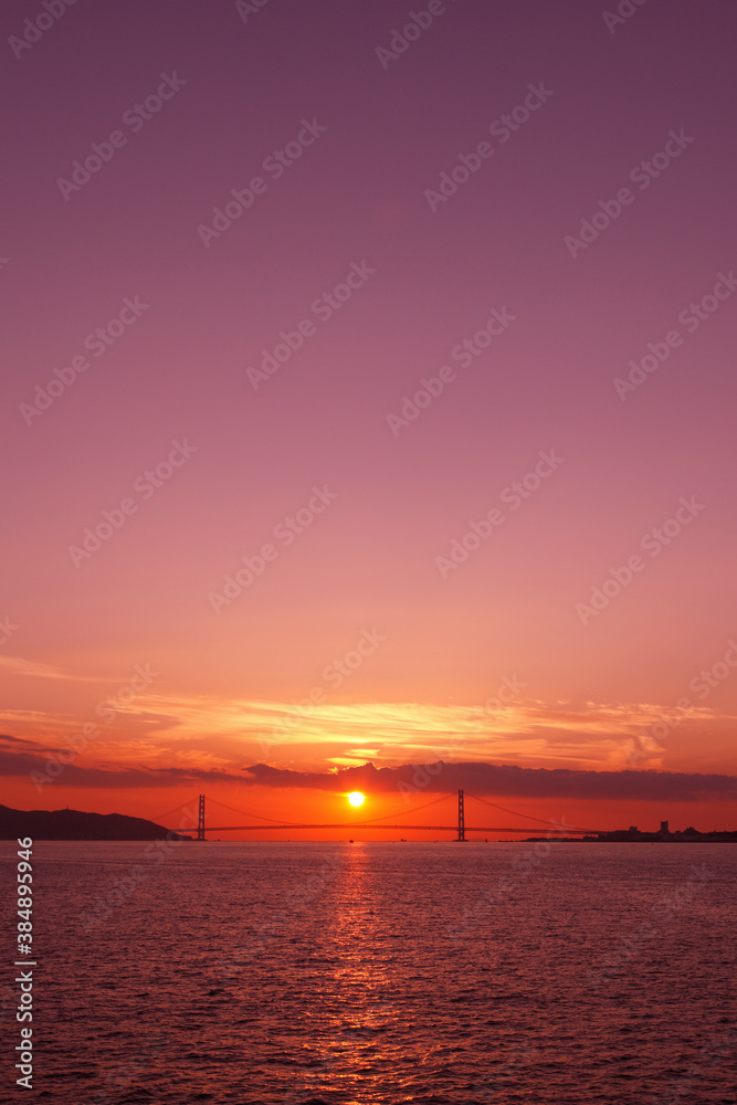 Obraz premium 明石海峡大橋と夕日