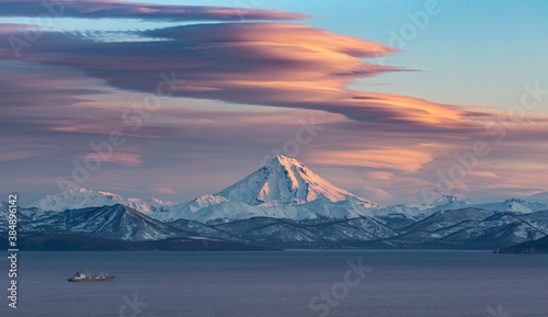 Kamchatka, Avachinskaya Bay against the background of Vilyuchinsky volcano at sunset.