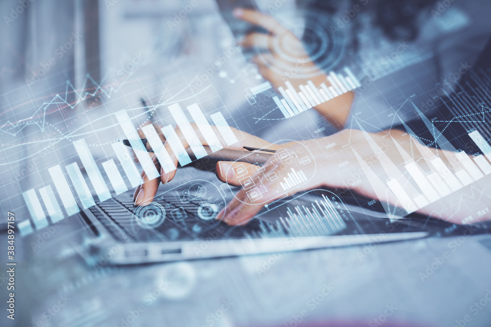Multi exposure of woman hands typing on computer and financial graph hologram drawing. Stock market analysis concept. Multi exposure of woman hands typing on computer and financial graph hologram drawing. Stock market analysis concept.