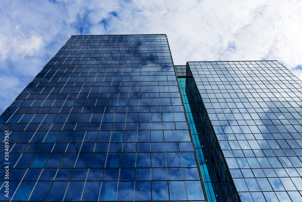 Reflex in the Skyscraper glass and metal on the cloudy Sky Reflex in the Skyscraper glass and metal on the cloudy Sky