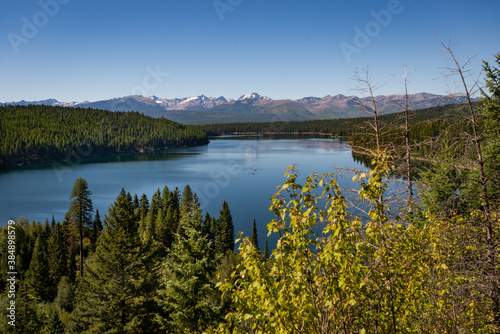 Holland Lake and Falls trail in Flathead National Forest, Montana. USA. Back to Nature concept.