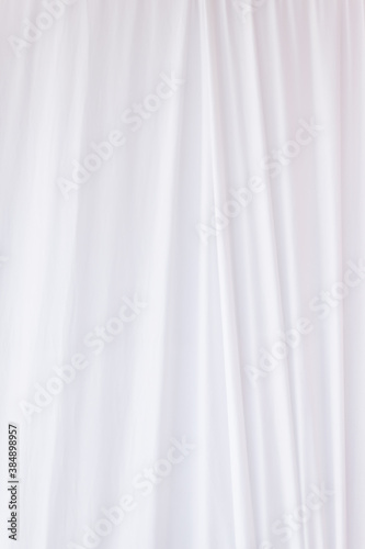 weißer faltiger Vorhang als Fotohintergrund