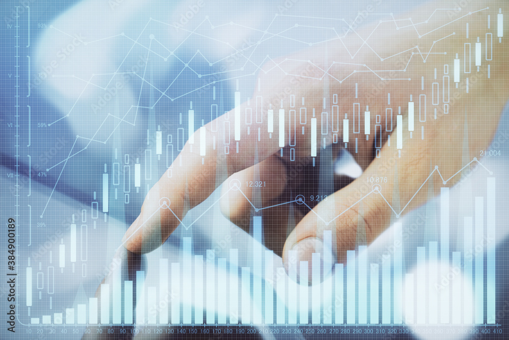 Multi exposure of man's hands holding and using a phone and financial chart drawing. Market analysis concept. Multi exposure of man's hands holding and using a phone and financial chart drawing. Market analysis concept.
