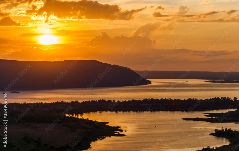 Obraz premium Landscape with sunset on the river in summer