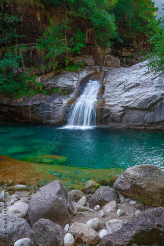 The turquoise color water creek and waterfalls in Emerald Valley  in Anhui province  China.