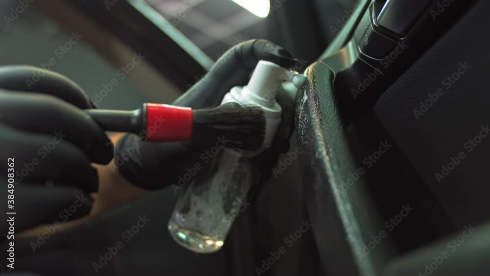 chemical treatment against bacteria, detailed clean brush car handles, man in black glove treats the surface of devices against bacteria chemical treatment against bacteria, detailed clean brush car handles, man in black glove treats the surface of devices against bacteria
