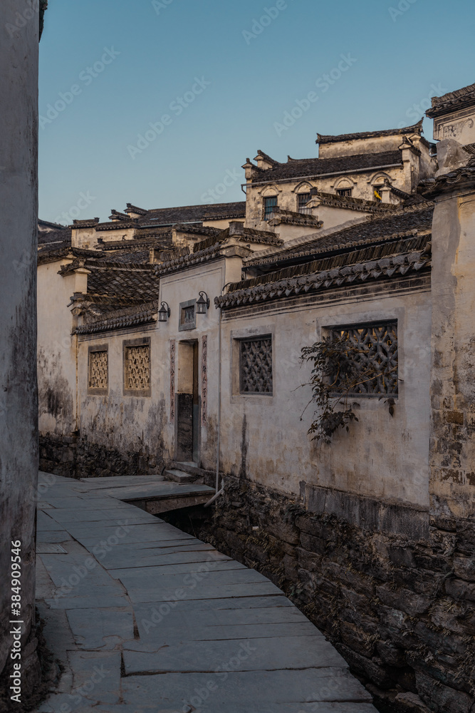 Sunrise view of the streets and architectures in Xidi village, an ancient Chinese village in Anhui Province, China, a UNESCO world cultural heritage site.