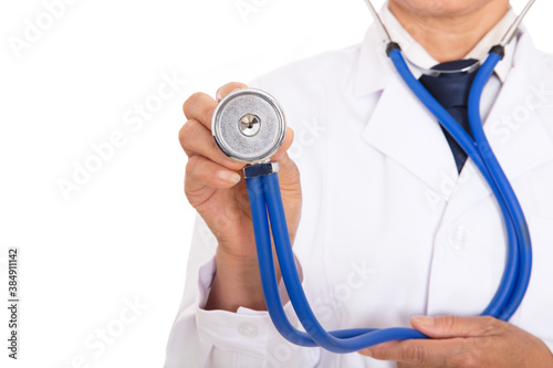 Close-up of doctor preparing to auscultate holding stethoscope in hand