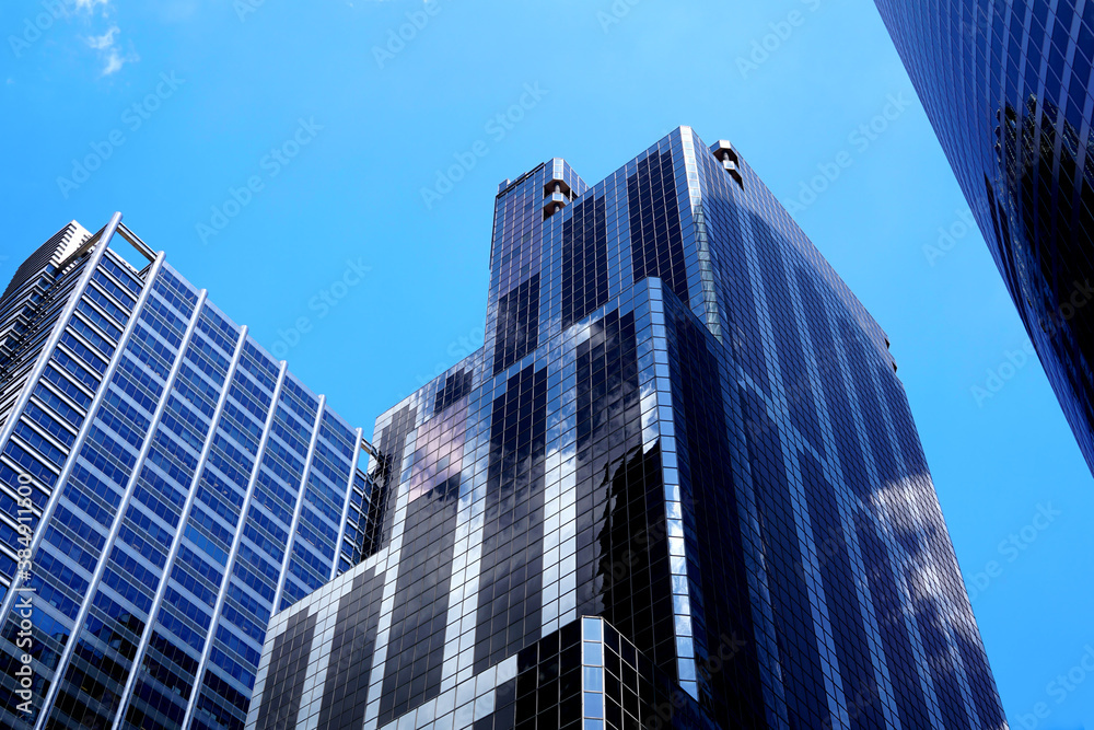 Downtown in the center of Chicago. Blue sky behind