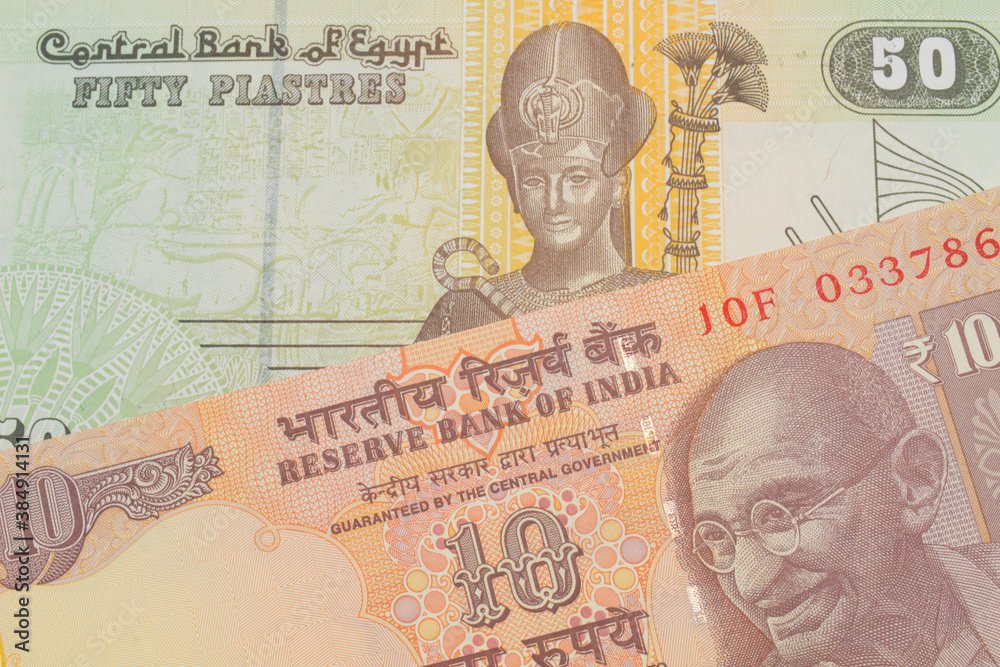 custom made wallpaper toronto digitalA macro image of a orange ten rupee bill from India paired up with a green and yellow fifty piastre note from Egypt. Shot close up in macro.
