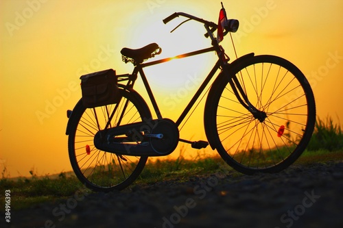 Bicycle landscape view against a beautiful sunset backdrop