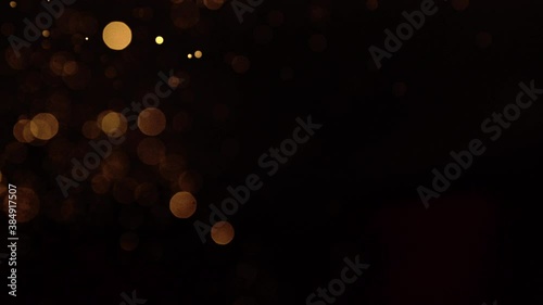 High-speed shooting of shining gold foil and gleaming slow motion