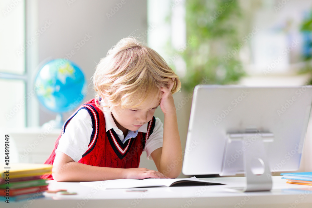 Online remote learning. School kids with computer. Online remote learning. School kids with computer.