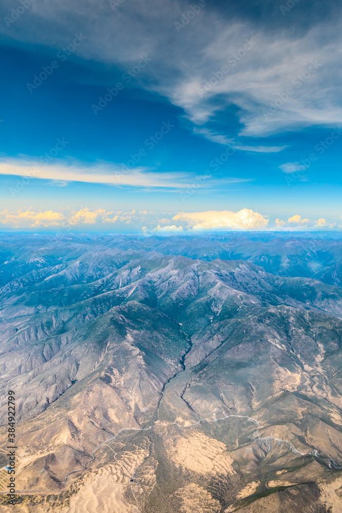 Aerial view of mountain and clouds scenery in Tibet,China.