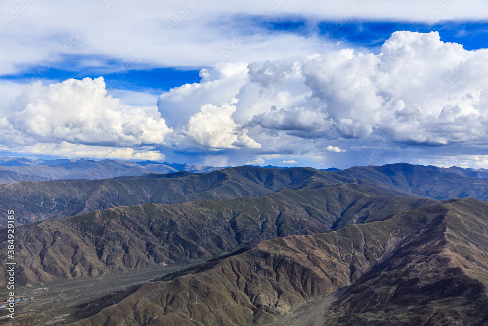 Aerial view of mountain and clouds scenery in Tibet,China.