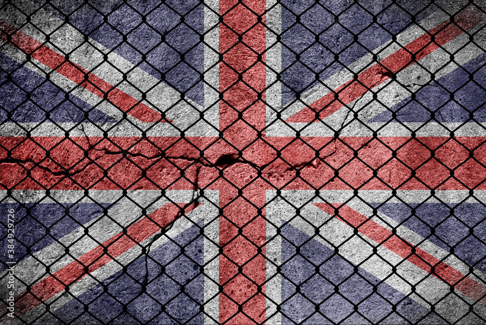 Flagge von Großbritannien und ein Zaun an der Grenze Flagge von Großbritannien und ein Zaun an der Grenze