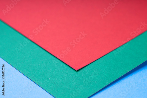 multi-colored sheets of paper , abstract background, tinted image, selective focus
