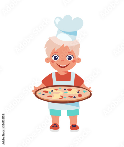 A kid in an apron and a chef s hat holds a platter of pizza or paella. Cooking lessons, profession of a cook, hobbies, recipes. Cartoon vector illustration isolated on white background