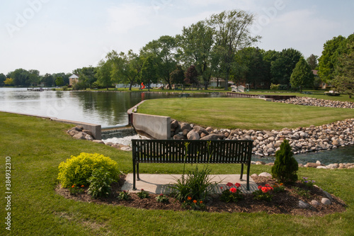 Playground Park in Green Lake Wisconsin USA with a bench to rest and enjoy the view