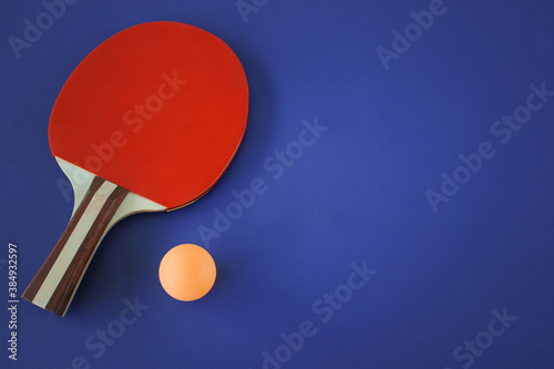 ping pong racket and ball