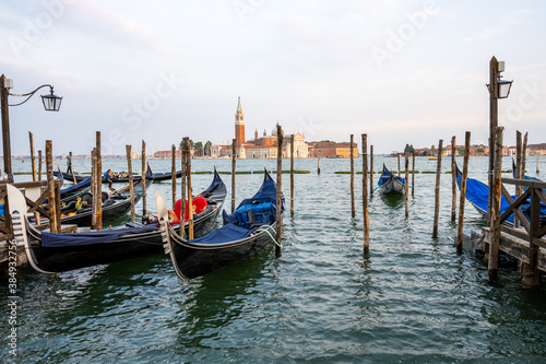 Gondolas at the Piazza San Marco in Venice, Italy, with San Giorgio Maggiore in the back © elxeneize