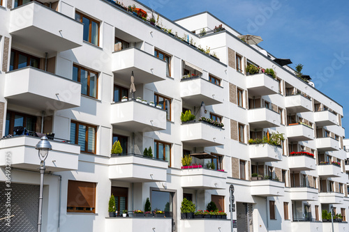 New apartment buildings with many balconies seen in Berlin © elxeneize