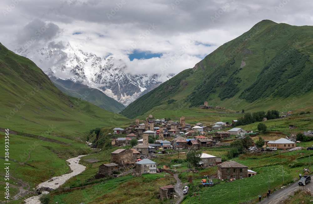 Ancient village Ushguli, recognized as the Svaneti UNESCO World Heritage Site, with mount Shkhara, the highest mount in Georgia, in the background. One of the highest inhabited settlements in Europe.